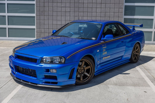 a blue nissan skyline r34 gtr